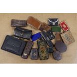 A large collection of unusual Morocco leather purses, bags and containers, some embossed and some