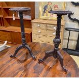 A near pair of Victorian style tripod tables with circular specimen marble tops, larger diameter