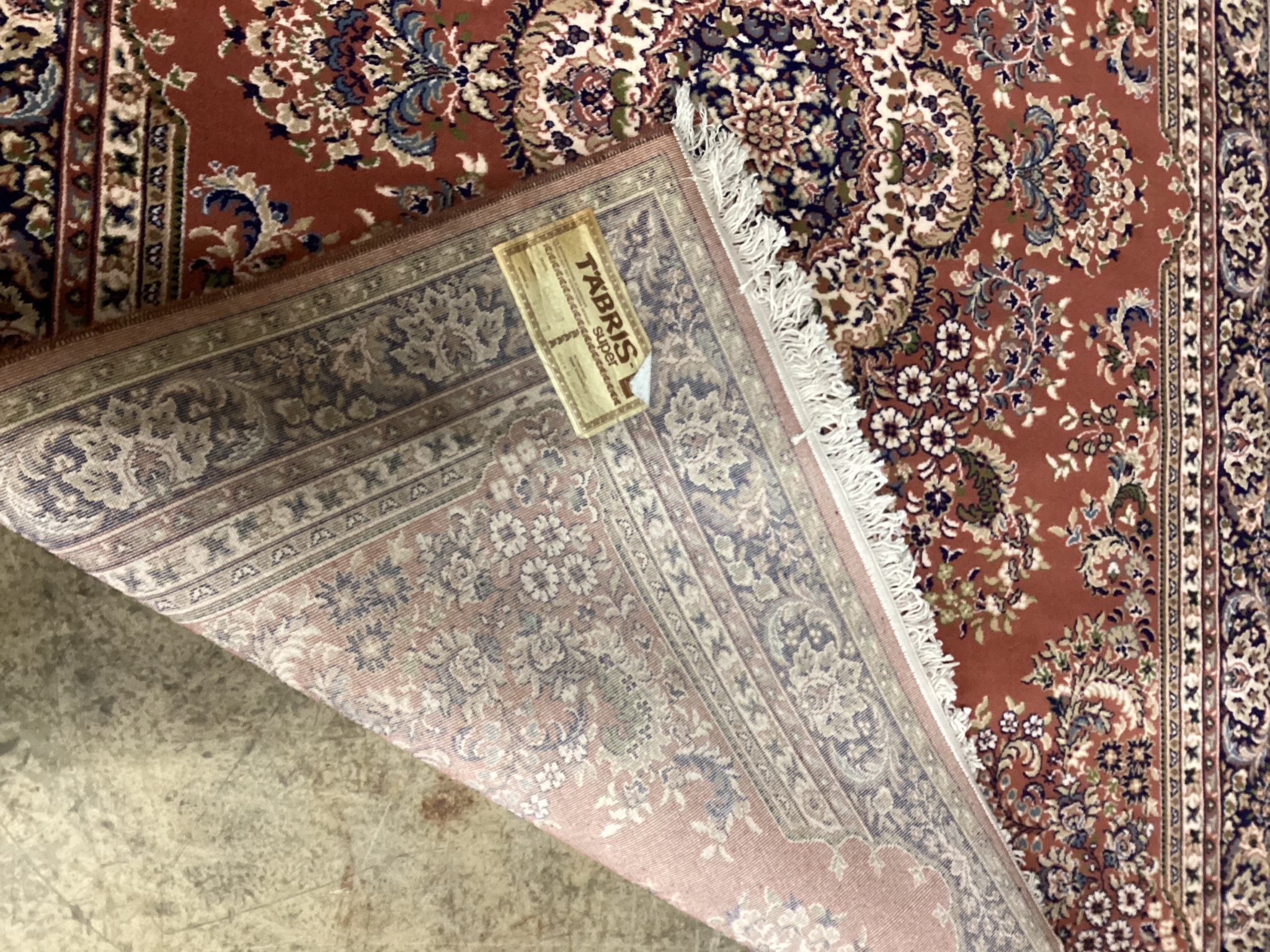A modern Tabriz style red ground rug, 240 x 162cm - Image 2 of 2