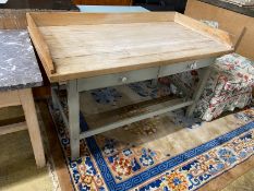 A late 19th / early 20th century part painted pine kitchen table with galleried top, length 150cm,