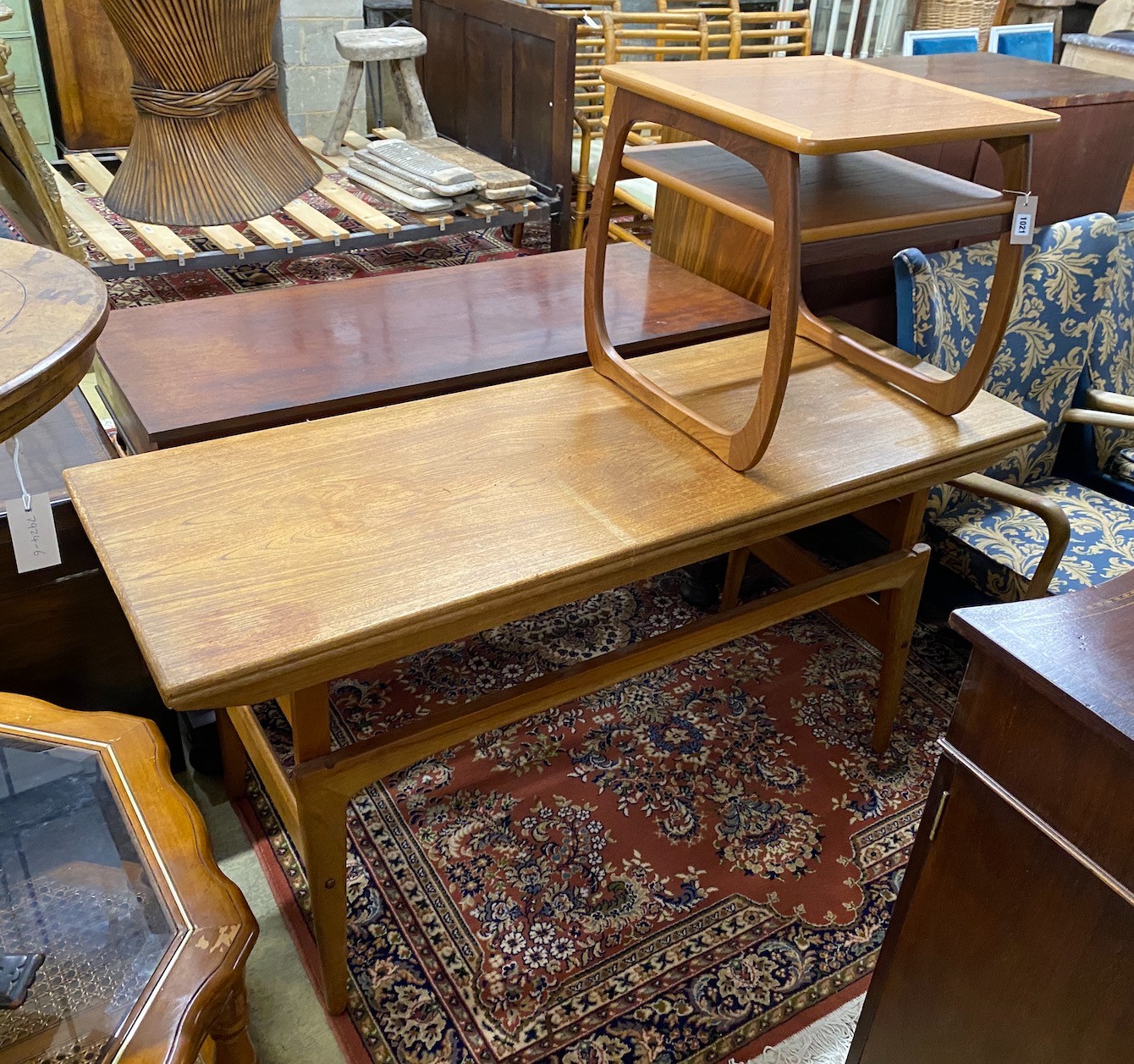 A mid century Trioh type “Copenhagen” metamorphic teak coffee / dining table, width 150cm, depth