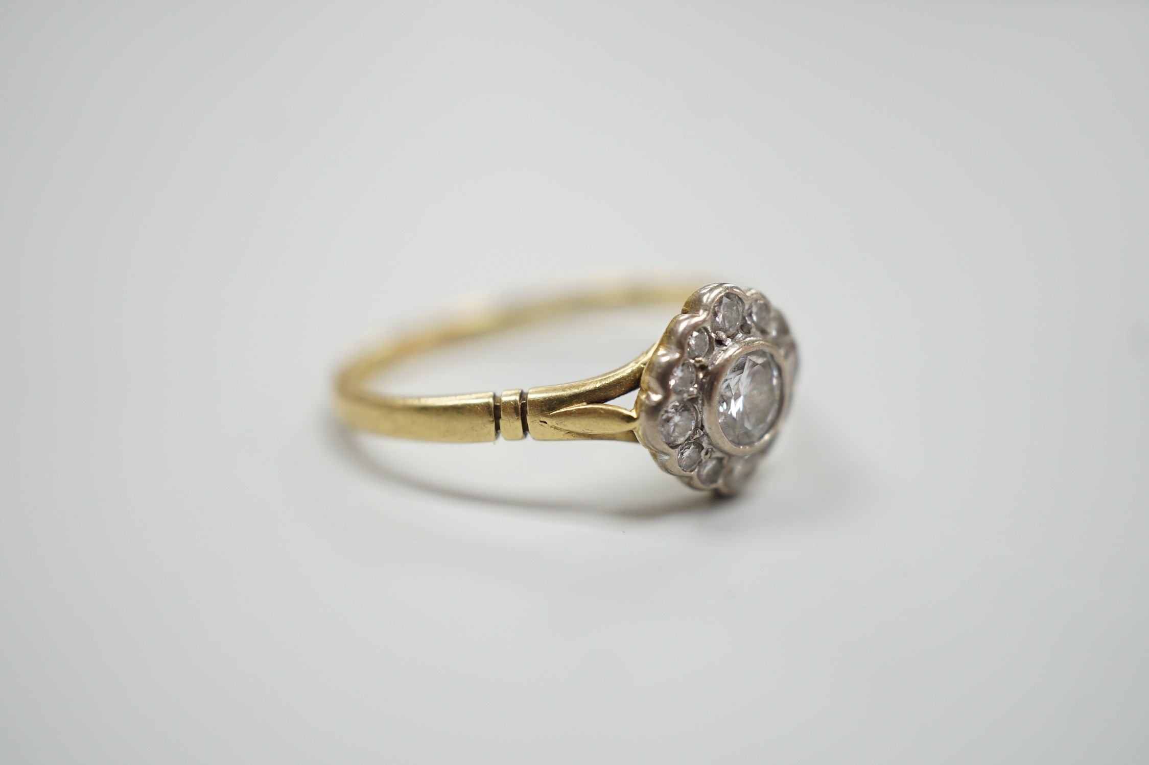 A modern 18ct gold and single stone diamond ring, with diamond set border, size S, gross weight 3. - Image 4 of 5