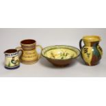 Margaret Brompton studio pottery bowl with insects, together with a slipware jug, a Longpark,