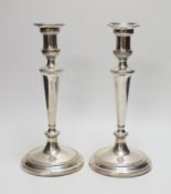 A pair of early 19th century Old Sheffield plate candlesticks. 28cm high