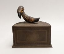 A YZ bird on bakelite cigarette dispenser by Henry Howell & Co Ltd for Alfred Dunhill & Co,