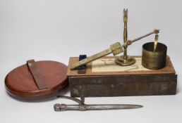 A late Georgian Marratt & Short Improved Chondrometer, a large surveyor's measure and a cast iron