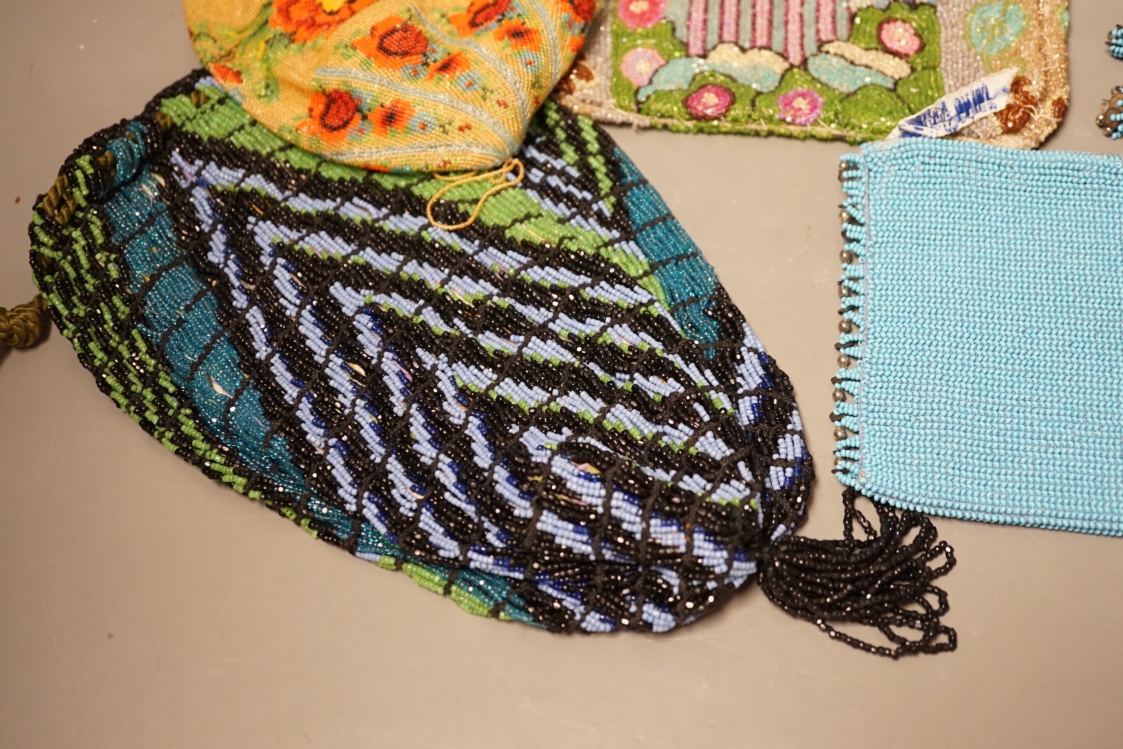 A late 19th century floral bead worked drawstring bag, a later jazz age beaded bag, a turquoise - Image 7 of 9