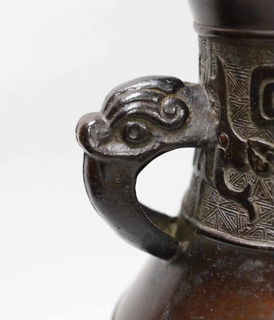 A Chinese archaistic bronze double handled 'hu' vase, 19th century, 27.5cm high - Image 2 of 5