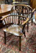 A near pair of 19th century Lincolnshire ash and elm Windsor elbow chairs, width 55cm, depth 38cm,