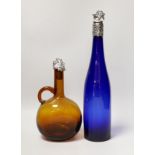 A blue glass hock bottle with George IV silver stopper and an amber glass spirit flask with