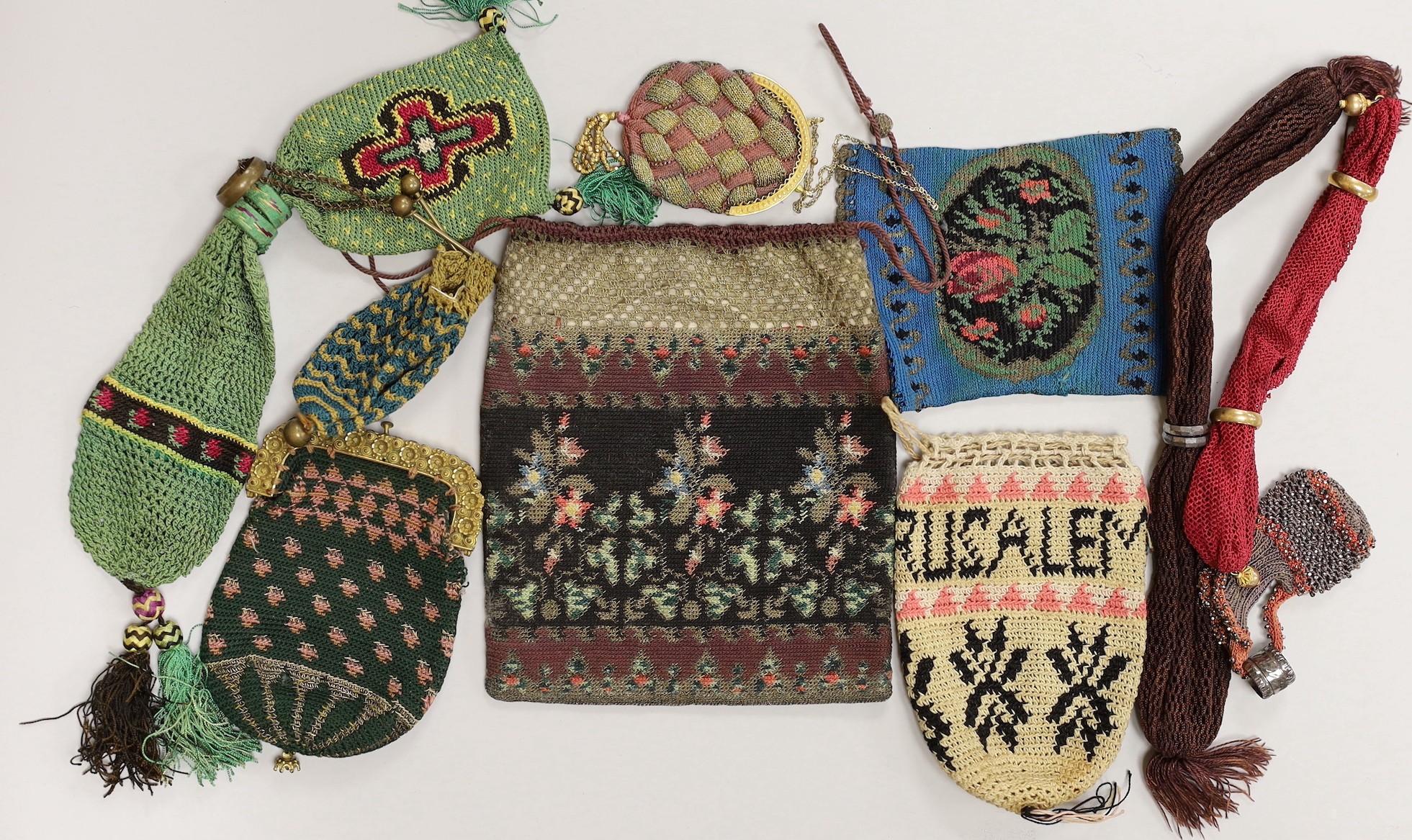 Three finely crocheted misters purses, six various shaped and sized purses and a finely crochet draw