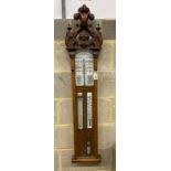 A Victorian carved oak cased Admiral Fitzroy barometer, height 120cm