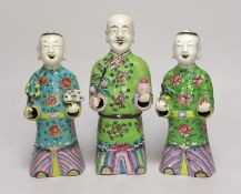 A near pair of Chinese polychrome-decorated figural incense burners and another similar incense