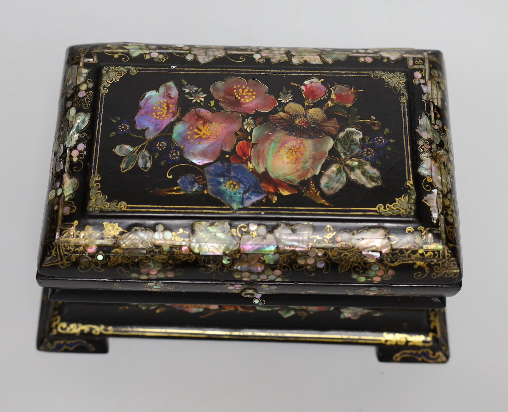 A Victorian painted and mother of pearl inlaid papier mache tea caddy. 23cm wide - Image 3 of 5