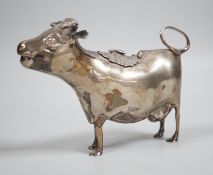 An Elizabeth II silver cow creamer, William Comyns & Sons Ltd, London, 1965, length 15cm, 152
