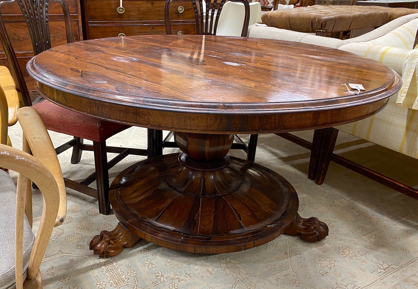 An early Victorian circular rosewood tilt top breakfast table, diameter 130cm, height 70cm