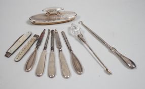 A small group of assorted manicure items and a leather travelling case containing a matched silver