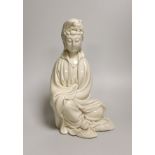 A signed Chinese Dehua blanc de Chine figure of Guanyin. 25cm high