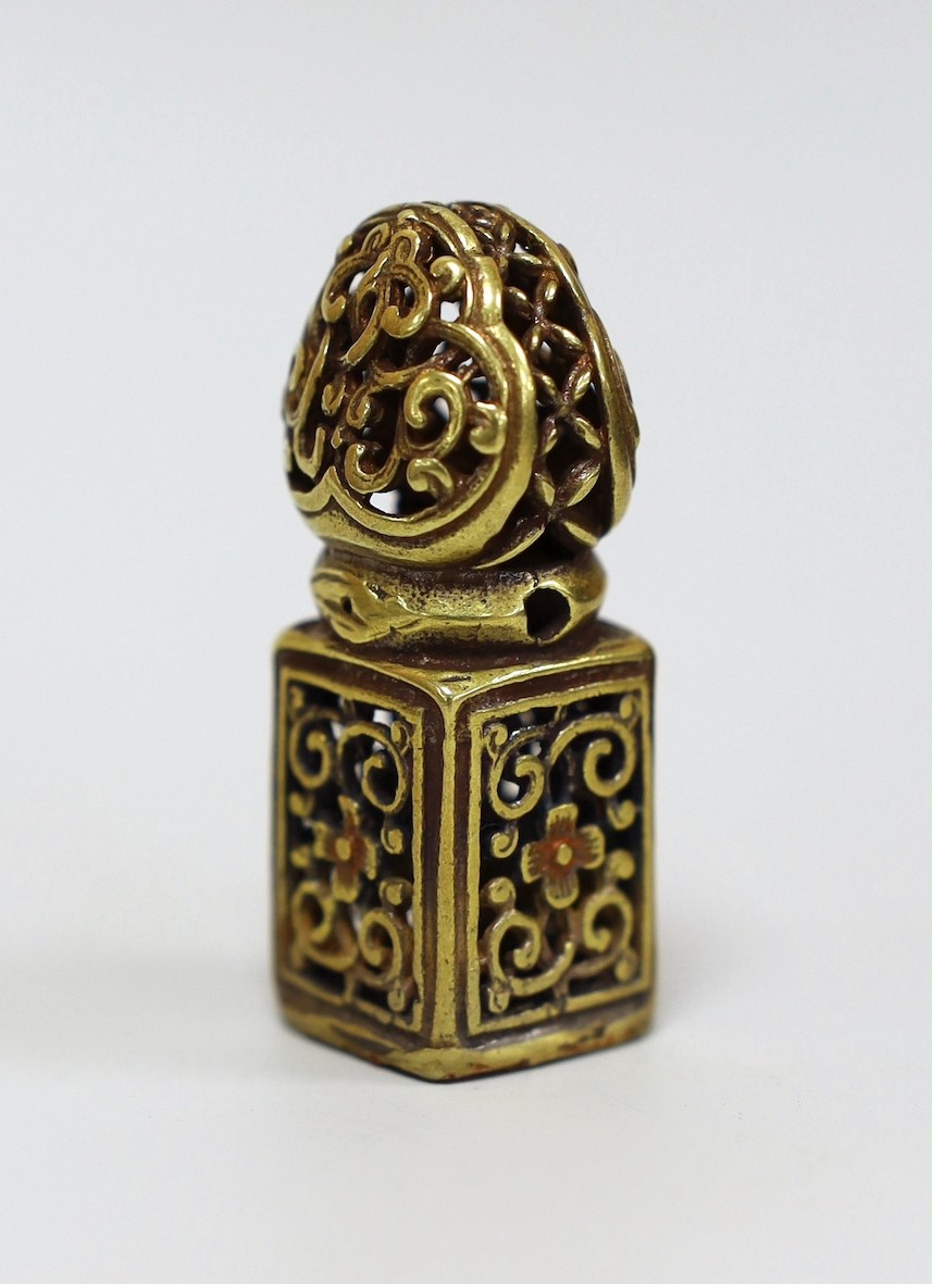 A Tibetan pierced bronze seal, 5.5cm