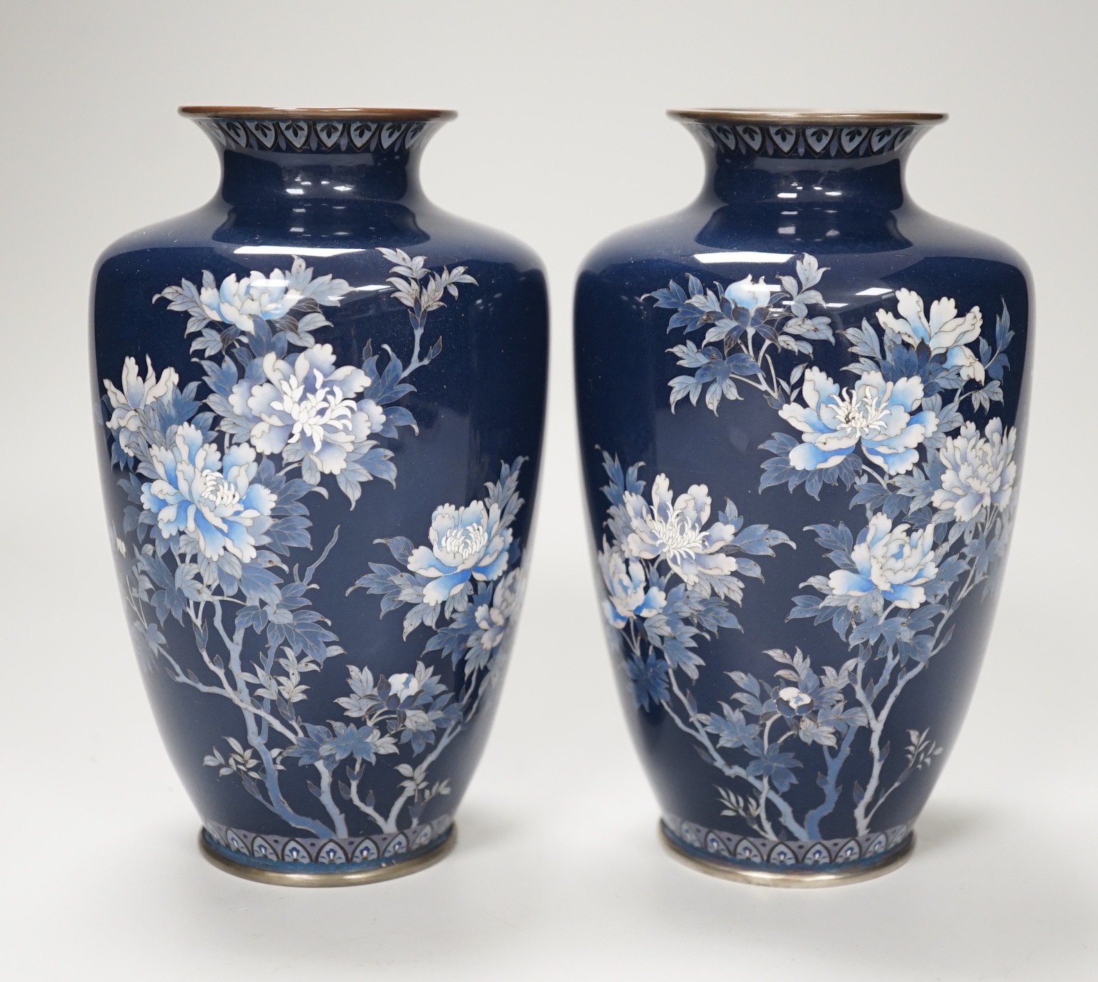 A pair of Japanese silver wine cloisonné enamel vases. 15cm high