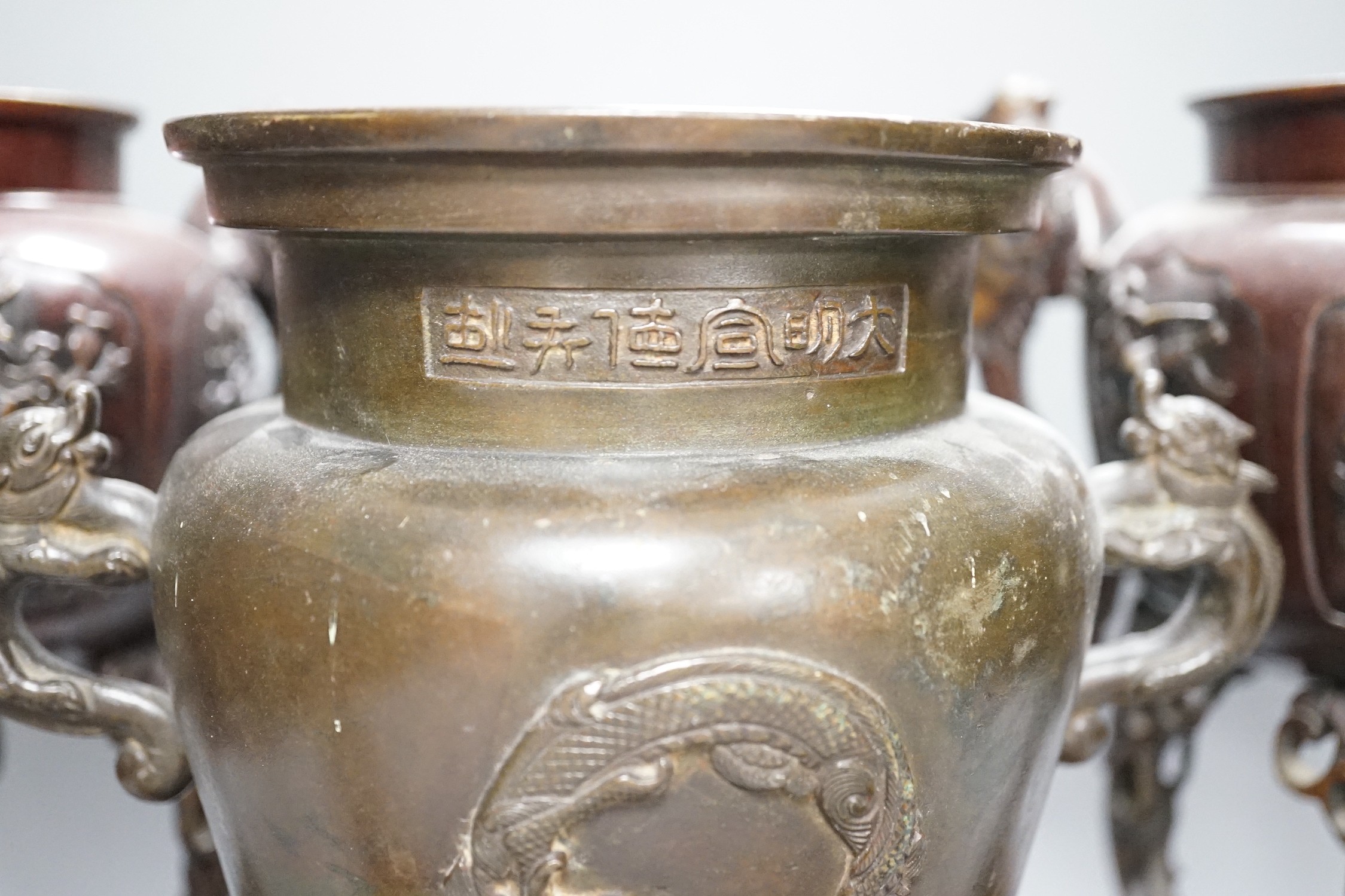 A pair of Japanese bronze vases and covers, 41 cm high and a Japanese two handled vase, 26 cm - Image 4 of 7