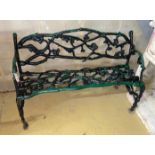 A Victorian Coalbrookdale style cast iron garden bench, length 124cm, depth 57cm, height 77cm