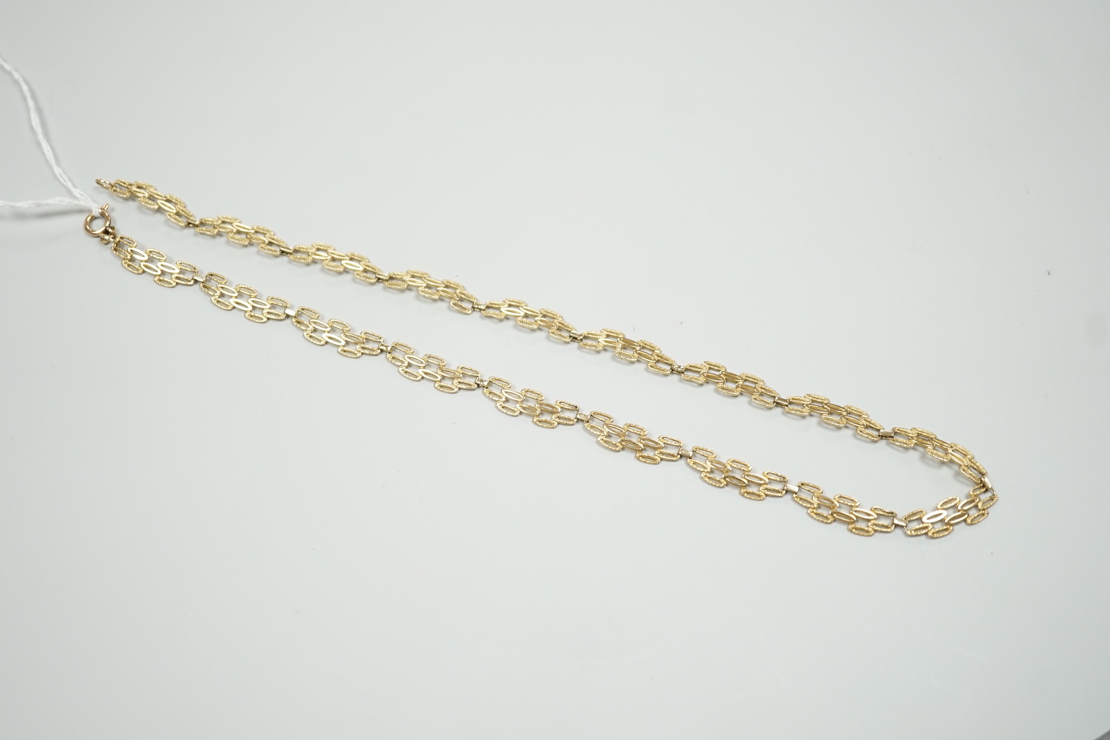 A 9ct gold pierced fancy link necklace, 45cm, 11 grams. - Image 3 of 5