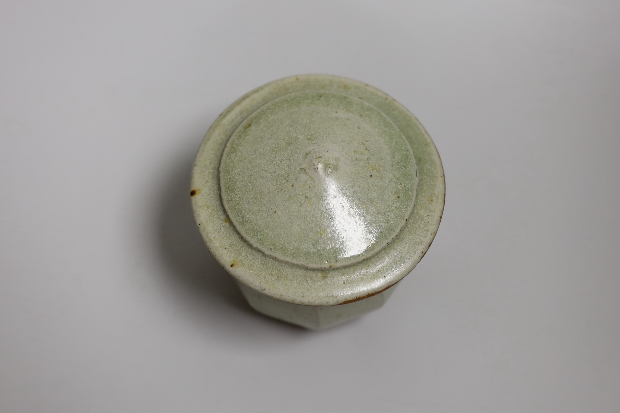 Richard Batterham (1936 – 2021), a cut sided stoneware jar and pointed cover with sage coloured - Image 3 of 5