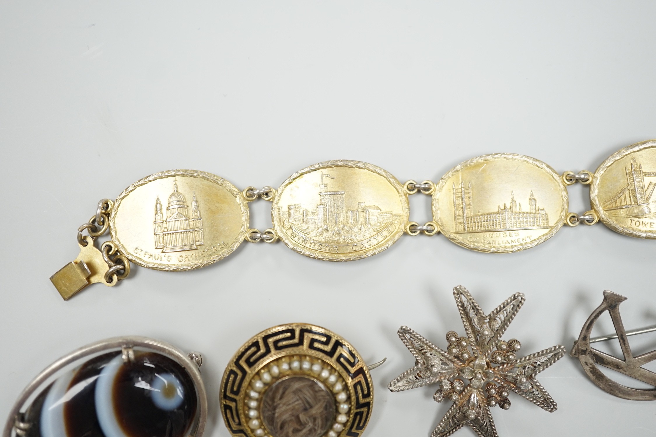 A 1940's silver gilt bracelet, each link embossed with a famous English landmark, 19cm and a - Image 10 of 12