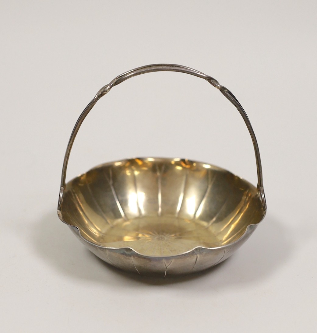 A Chinese white metal lotus leaf sweetmeat basket by Wang Hing, Hong Kong, diameter 10.7cm, 109