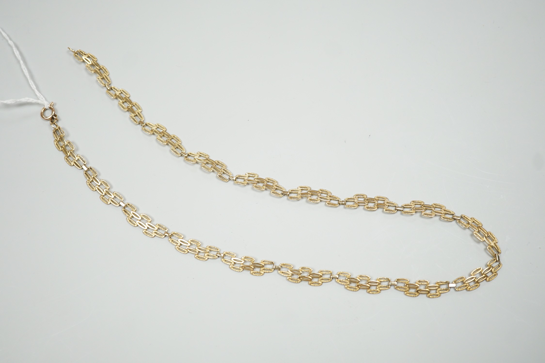 A 9ct gold pierced fancy link necklace, 45cm, 11 grams. - Image 2 of 5