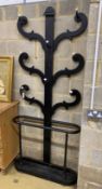 A Victorian hall stand with tin drip tray, later painted black, width 90cm, height 215cm