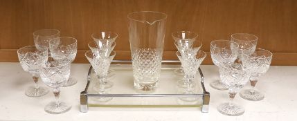 A mid century chrome and perspex drinks tray with 6 cocktail glasses, mixing glass and 8 wine