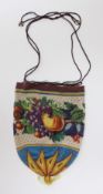 An unusual finely beaded early 19th century draw string bag, decorated with a wide band of multi