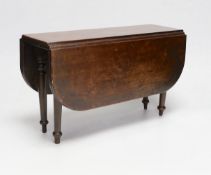Miniature furniture - an early Victorian model of a mahogany drop leaf dining table, 36cm