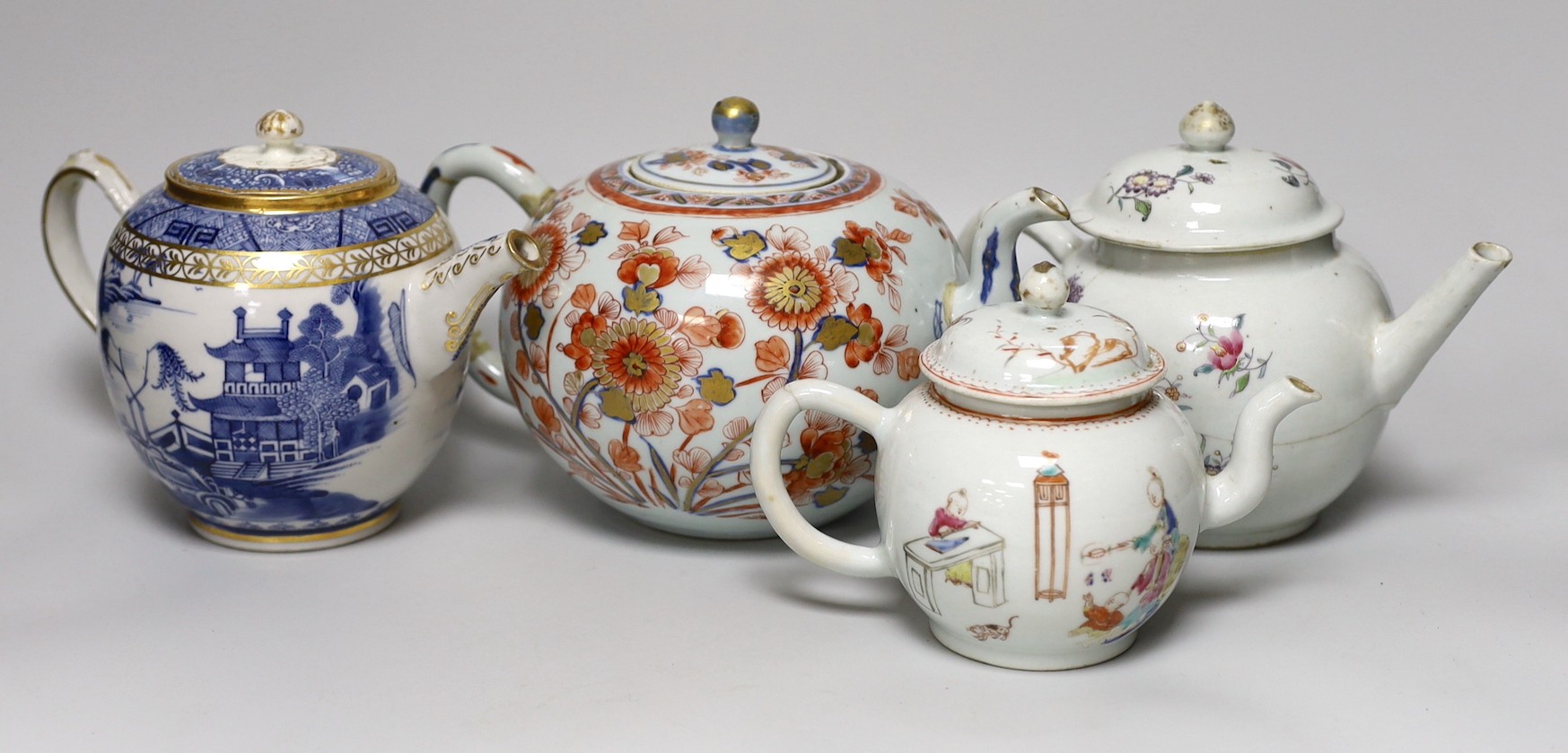 Four 18th century Chinese Export porcelain teapots. Tallest 15cm