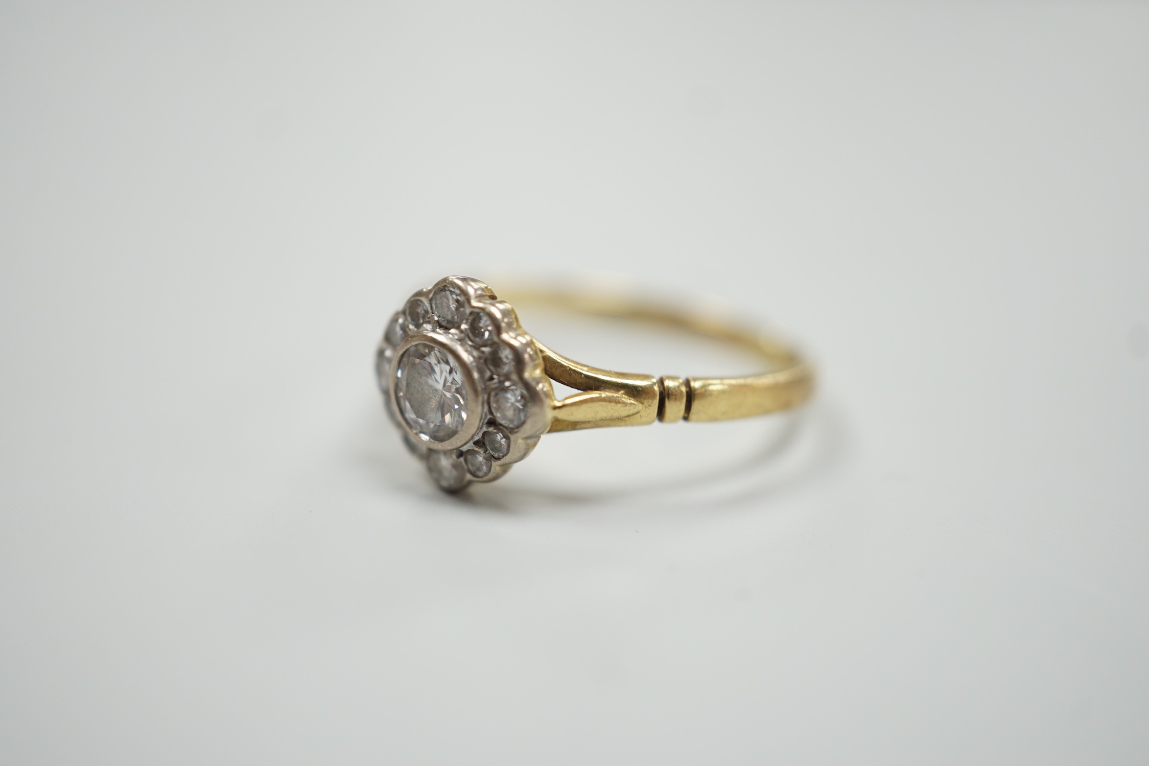 A modern 18ct gold and single stone diamond ring, with diamond set border, size S, gross weight 3. - Image 3 of 5