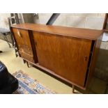 A mid century teak side cabinet (with faults), length 198cm, depth 45cm, height 121cm