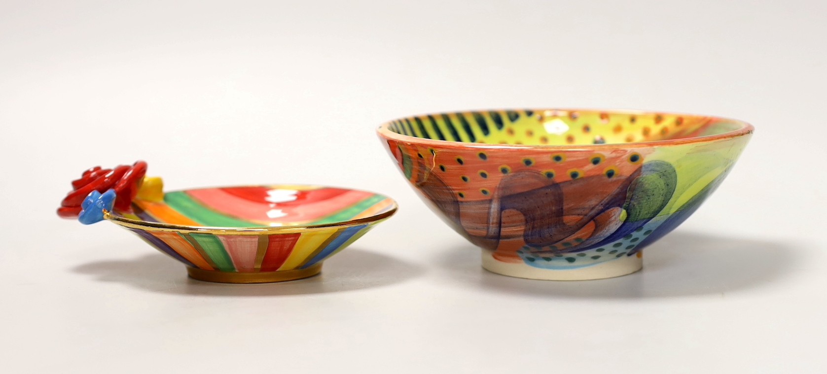 A Mary Rose Young striped dish, together with a Gwili Pottery painted bowl. Tallest 6cm