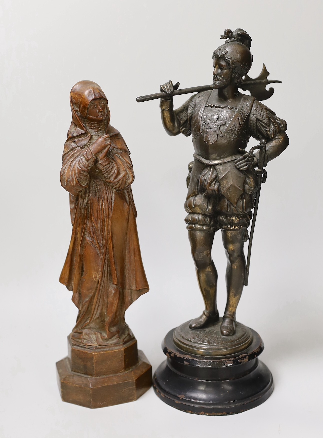 A 19th century carved wood figure of the ‘Virgin of Nuremberg’ together with a spelter figure of a