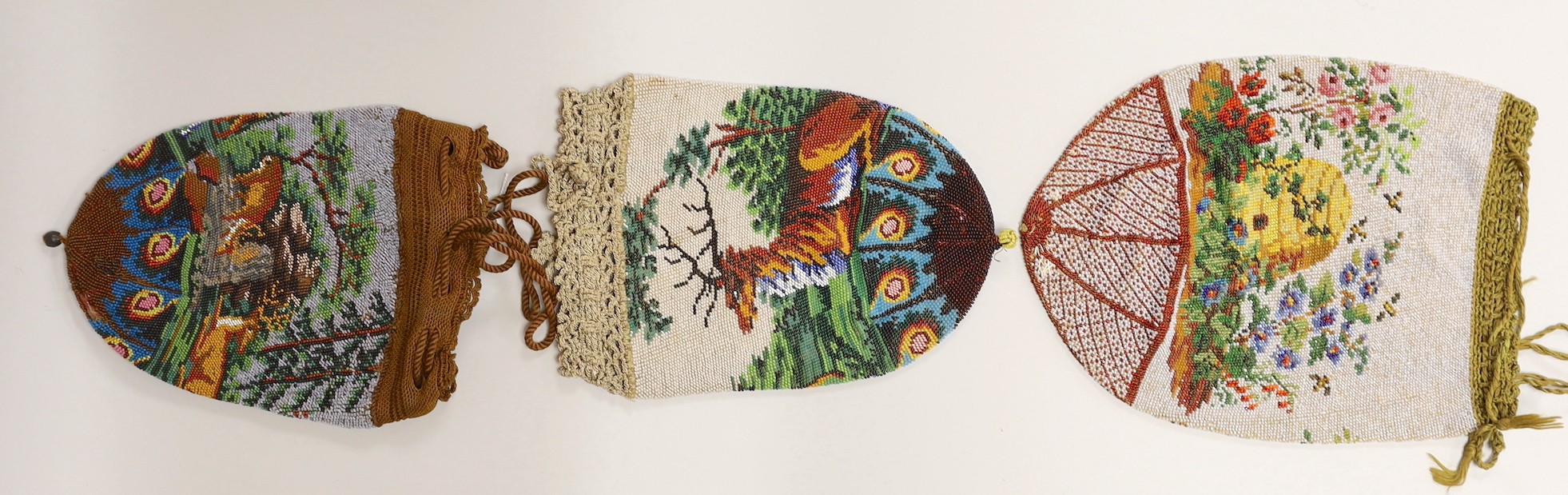 Two 19th century draw string beaded bags with hunting scenes, possibly American and a similar beaded - Image 2 of 2