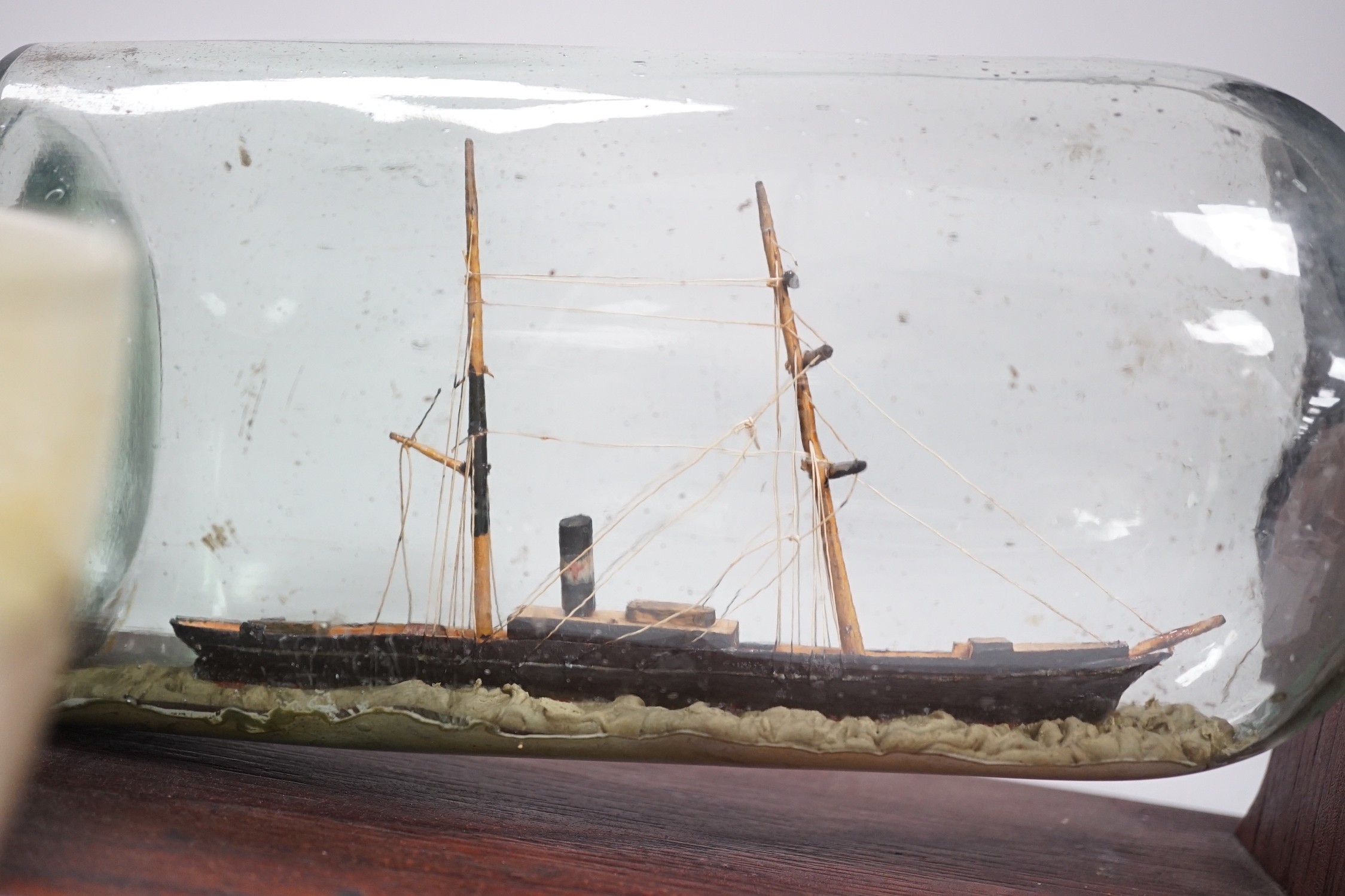 A Royal Doulton series ware bowl, a ship in a bottle and a Gordon Highlanders white metal mounted - Image 4 of 7