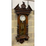 A Victorian walnut eight day Vienna regulator wall clock, height 134cm