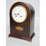 An Edwardian brass mounted mantel clock, 28.5cms high