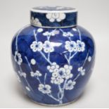 A Chinese blue and white prunus jar and cover, late 19th century, 20.5cms high