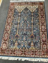 A North West Persian blue ground rug, 190cm x 126cm