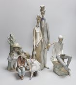 A group of four Lladro figures. Tallest 50cm