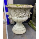 A reconstituted stone campana garden urn, diameter 56cm, height 64cm