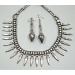 A late 20th century Balinese 925 white metal drop fringe necklace, 43cm, together with a pair of