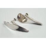 A pair of 1970's silver Georg Jensen curved teardrop shaped ear clips, design no. 130, 40mm.